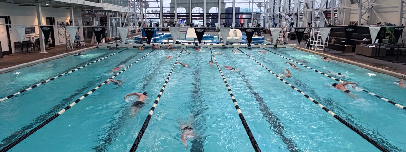 View across the pool toward the entrance of The Plunge